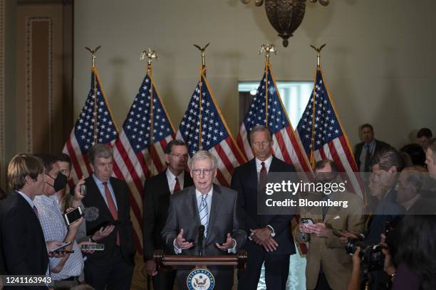 Senate Minority Leader Mitch McConnell, a Republican from Kentucky, center, speaks during a news conference following the weekly Republican caucus...