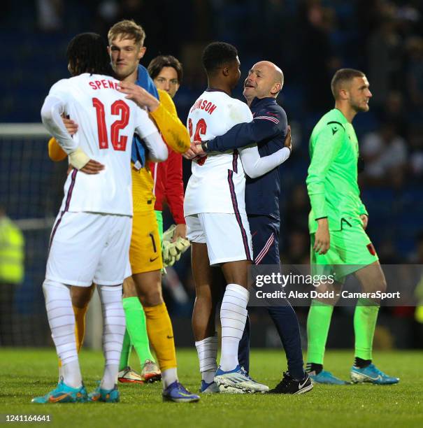 England's Manager Lee Carsley hugs Ben Johnson after the UEFA European Under-21 Championship Qualifier between England U21 and Albania U21 at...