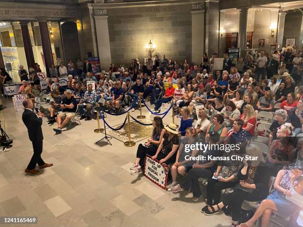 Sen. Rick Brattin, R-Harrisonville, spoke at a rally against the federal COVID-19 vaccine rule for employers at the Missouri State Capitol in...