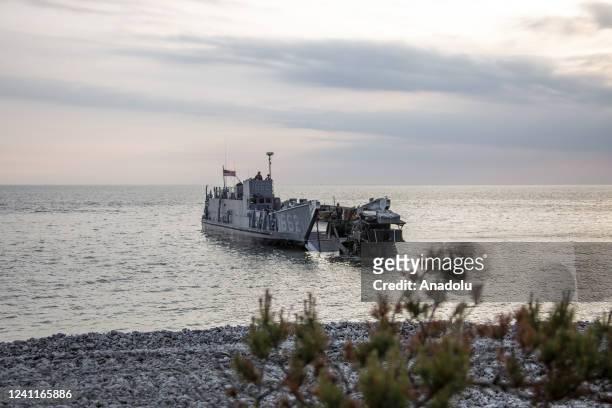Marines take part of an amphibious landing exercise in the Tofta military firing range area in the outskirts of Visby, Gotland, during the Baltops...