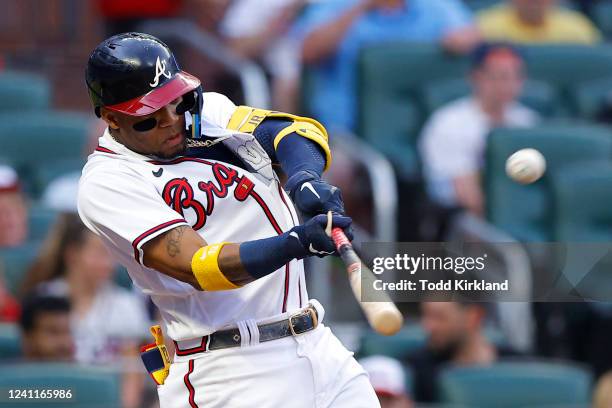 Ronald Acuna Jr. #13 of the Atlanta Braves hits a solo home run during the first inning against the Oakland Athletics at Truist Park on June 7, 2022...