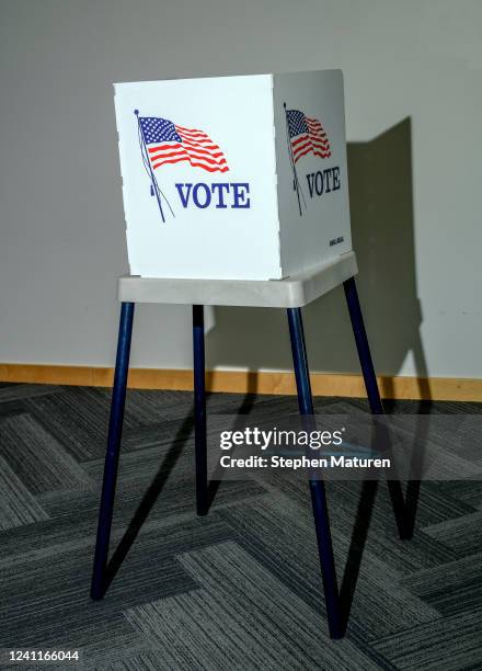 Voting booth is shown set up at the Ames Public Library on Primary Election Day on June 7, 2022 in Ames, Iowa. Iowa is one of seven states holding...