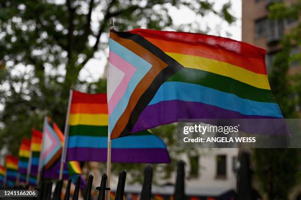 Rainbow flags, a symbol of lesbian, gay, bisexual, transgender and queer pride and LGBT social movements, are seen outside the Stonewall Monument in...