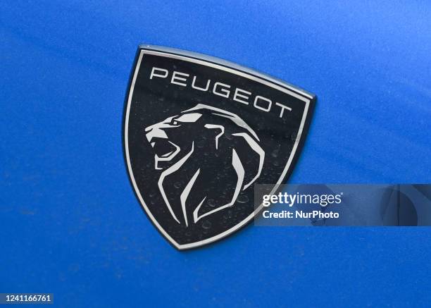 Peugeot logo seen on a parked Peugeot 308 car in Krakow city center. On Tuesday, June 07 in Krakow, Poland.