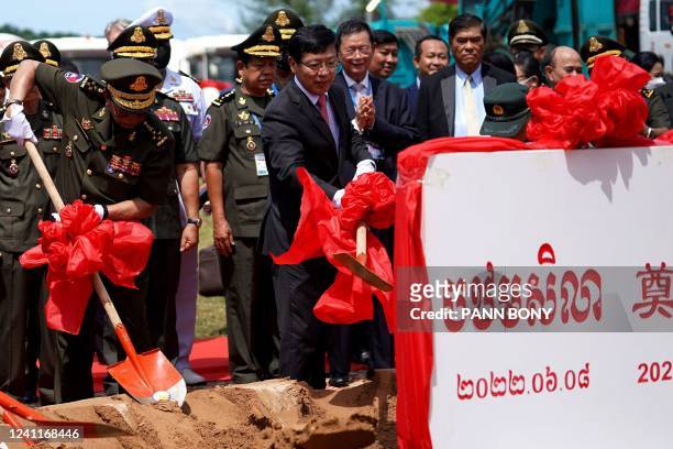 Cambodia's Defence Minister Tea Banh and China's Ambassador to Cambodia Wang Wentian take part in a groundbreaking ceremony at the Ream naval base in...