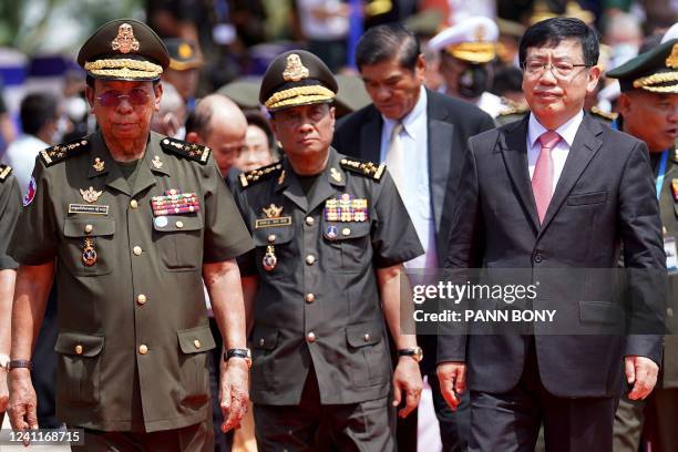 Cambodia's Defence Minister Tea Banh and China's Ambassador to Cambodia Wang Wentian take part in a groundbreaking ceremony at the Ream naval base in...