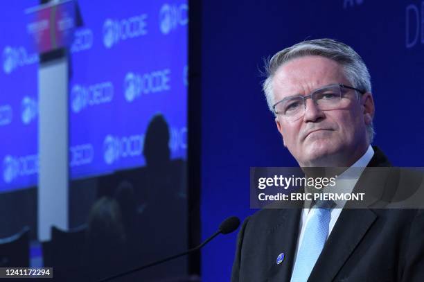 Secretary General Mathias Cormann looks on during a press conference to present the OECD Economic outlook at the OECD headquarters in Paris on June...