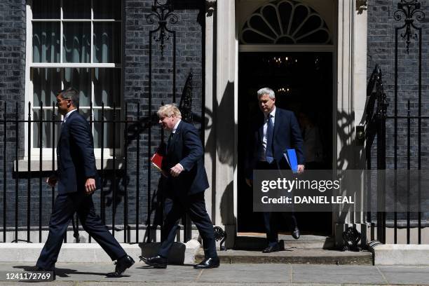 Britain's Prime Minister Boris Johnson leaves from 10 Downing Street in central London on June 8, 2022 to attend the weekly session of Prime...