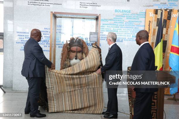 Congo President Felix Tshisekedi and King Philippe - Filip of Belgium unveil the Katuungu mask coming from AfricaMuseum in Tervuren, during a visit...