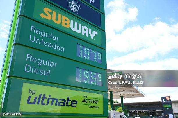 The price of Diesel and Unleaded Petrol fuels are displayed on a sign outside a BP petrol station in Wigan, north west England on June 8, 2022....