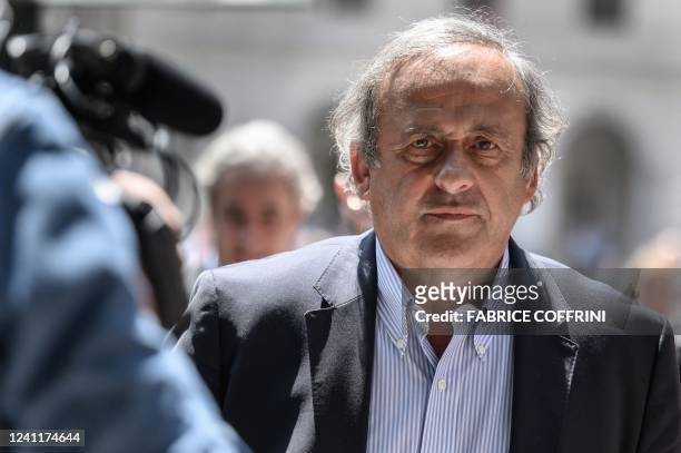 Former UEFA president Michel Platini leaves Switzerland's Federal Criminal Court after the first day of his trial over a suspected fraudulent payment...