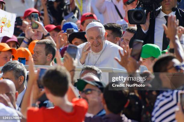 Pope Francis arrives to attend his weekly general audience in St. Peter's Square at The Vatican, Wednesday, June 8, 2022.