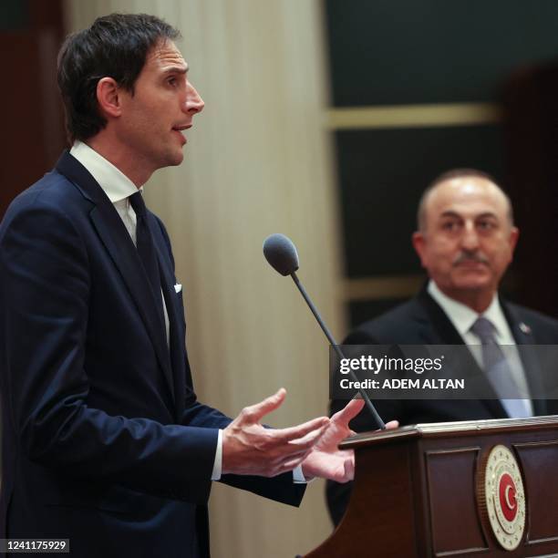 Turkish Foreign Minister Mevlut Cavusoglu listens to his Dutch counterpart Wopke Hoekstra during a joint press conference in Ankara, on June 8, 2022.