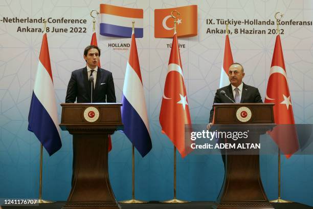 Turkish Foreign Minister Mevlut Cavusoglu listens to his Dutch counterpart Wopke Hoekstra during a joint press conference in Ankara, on June 8, 2022.