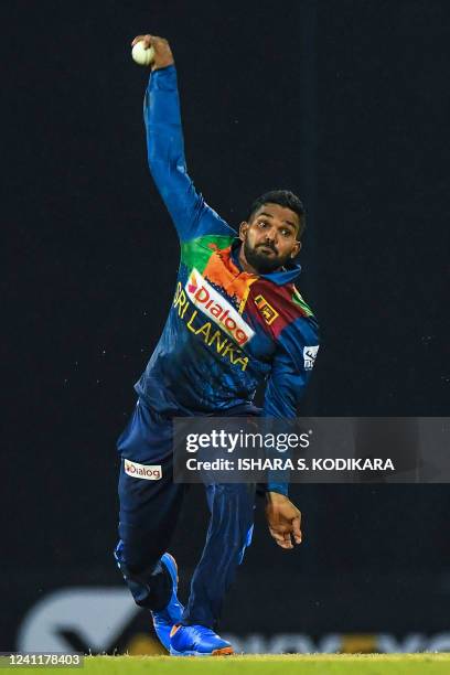 Sri Lanka's Wanindu Hasaranga delivers a ball during the second Twenty20 international cricket match between Sri Lanka and Australia at the R....