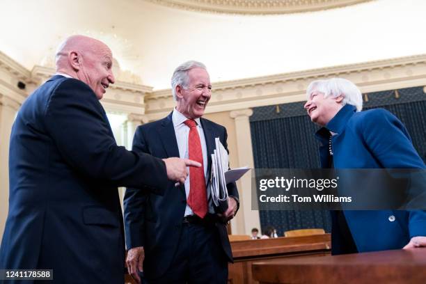 Chairman Richard Neal, D-Mass., center, ranking member Rep. Kevin Brady, R-Texas, and Treasury Secretary Janet Yellen talk before the Ways and Means...