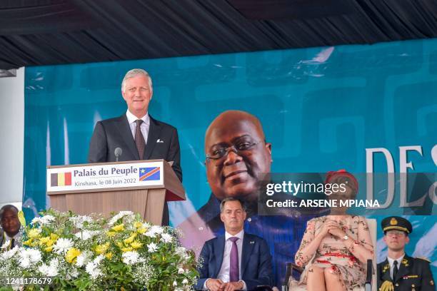 Belgium's King Philippe pauses during his address at the National Assembly in Kinshasa on June 8, 2022 as Belgium Queen Mathilde and Belgium Prime...