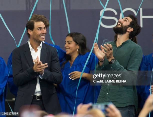 Spain's Rafael Nadal and Spanish NBA basketball player Ricky Rubio smile during the graduation ceremony of the sixth promotion of the Rafa Nadal...