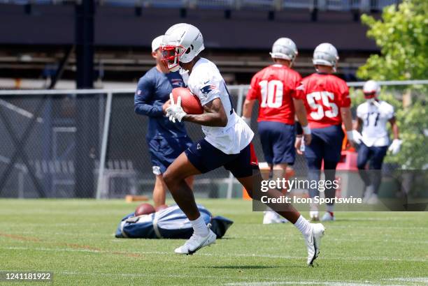 New England Patriots wide receiver DeVante Parker carries the ball during Day 2 of mandatory New England Patriots minicamp on June 8 at the Patriots...