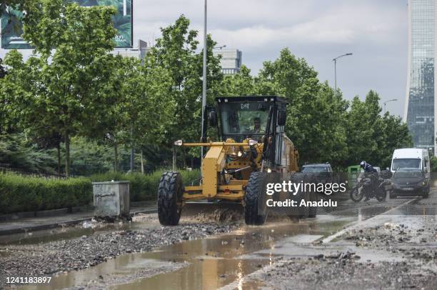 The drivers face heavy rains and damaged roads that disrupted the city in Ankara, Turkiye on June 08, 2022.