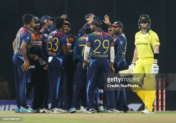 Sri Lankans celebrate after taking the wicket during the second Twenty20 cricket match between Sri Lanka and Australia at R. Premadasa Stadium in...