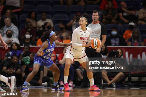 Alysha Clark of the Washington Mystics handles the ball during the game against the Chicago Sky on June 8, 2022 at Entertainment & Sports Arena in...