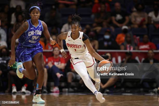 Ariel Atkins of the Washington Mystics handles the ball during the game against the Chicago Sky on June 8, 2022 at Entertainment & Sports Arena in...