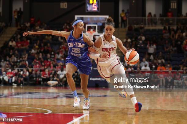 Natasha Cloud of the Washington Mystics handles the ball during the game against the Chicago Sky on June 8, 2022 at Entertainment & Sports Arena in...