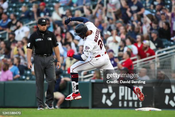 Byron Buxton of the Minnesota Twins celebrates his solo home run as he rounds the bases in the fifth inning of the game against the New York Yankees...