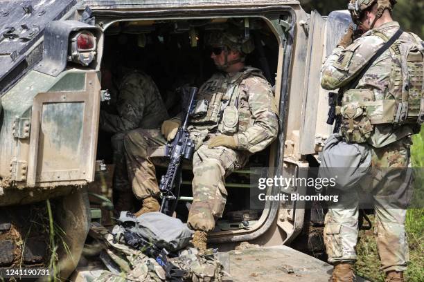 Army soldiers in an M2 Bradley infantry fighting vehicle during the Combined Resolve 17 multinational training exercise, with participating forces...