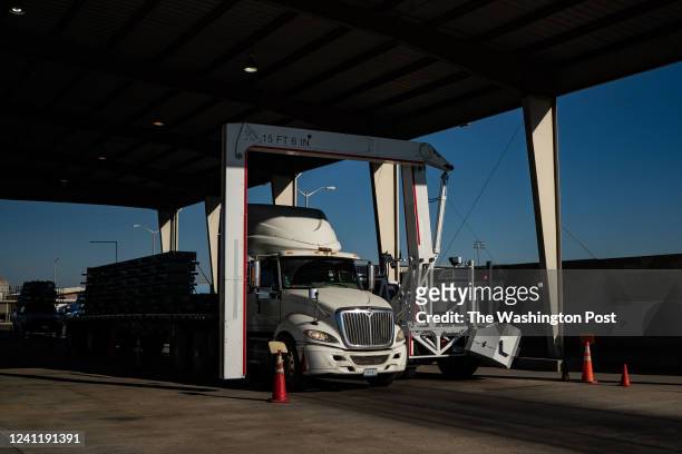 Truck goes through a scanner as it makes its way into the U.S. From Mexico at the Laredo Port of Entry in Laredo, Texas, Friday, January 14, 2022.