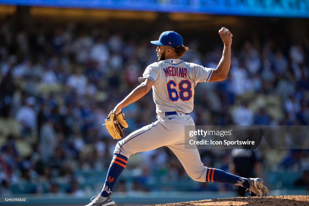 Mess Pitcher New York Mets relief pitcher Adonis Medina pitches the ball during a ...