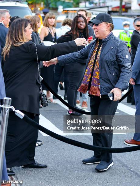 Elaine Goldsmith-Thomas and Tommy Mottola are seen outside 'Halftime' Premiere at the United Palace Theater on June 08, 2022 in New York City.