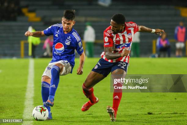 Omar Albornoz of Junior and Daniel Ruiz of Millonarios fight for the ball during the match of matchday 4 of the quadrangular semifinals of the...