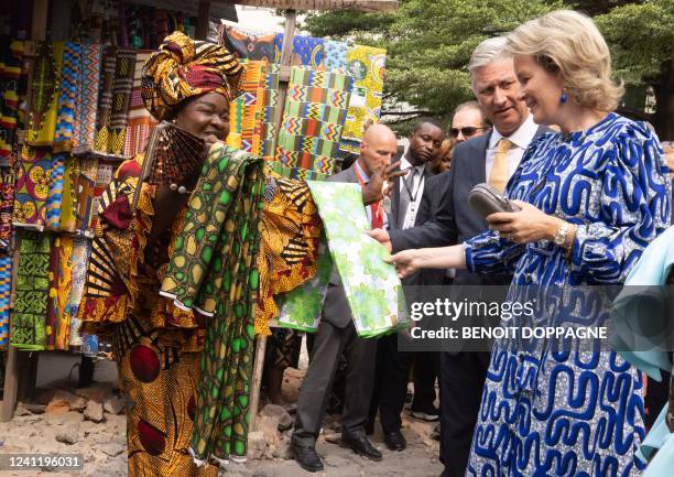 Queen Mathilde of Belgium and King Philippe - Filip of Belgium pictured during a meeting with the 'mamans' at the Beach Ngobila market, during an...