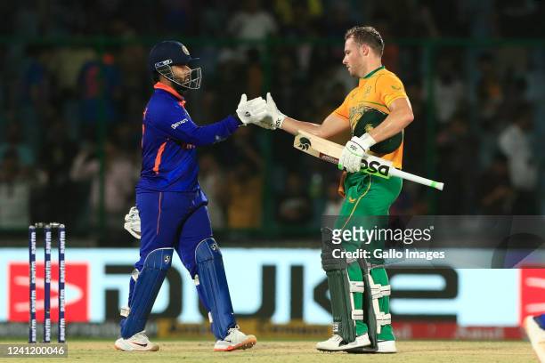 David Miller of South Africa handshakes with Rishabh Pant of of India after the win during the 1st T20 International match between India and South...