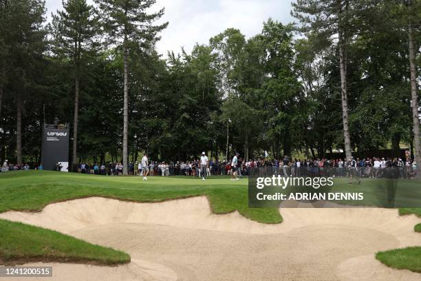 Golfer Phil Mickelson and US golfer Dustin Johnson on the 3rd green on the first day of the LIV Golf Invitational Series event at The Centurion Club...