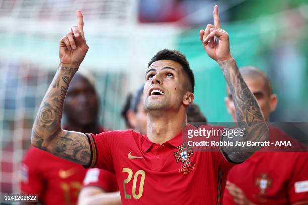 Joao Cancelo of Portugal celebrates after scoring a goal to make it 1-0 during the UEFA Nations League League A Group 2 match between Portugal and...
