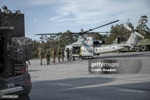 And Swedish troops evacuate a wounded comrade as they take part of a war simulation called âthe battle of Broâ during the Baltops 22, the Balticâs...