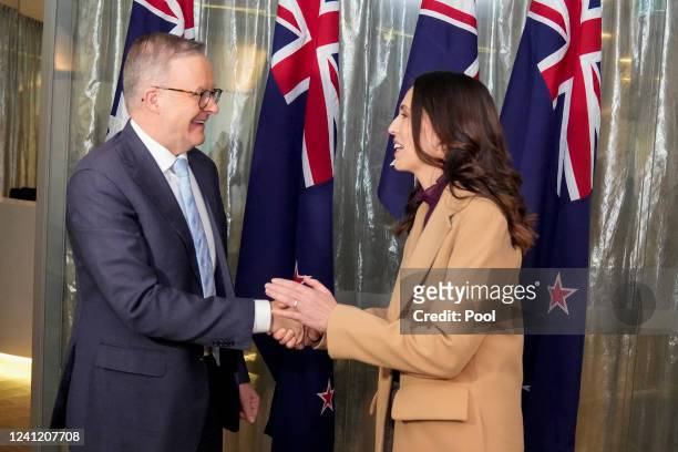 Australian Prime Minister Anthony Albanese greets his New Zealand counterpart Jacinda Ardern ahead of a bilateral meeting on June 10, 2022 in Sydney,...