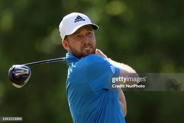 Daniel Berger of Jupiter, Florida hits from the 18th tee during the final round of The Memorial Tournament presented by Workday at Muirfield Village...