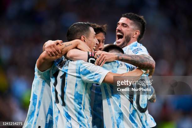 Angel Di Maria of Argentina celebrates with Lionel Messi and Rodrigo de Paul after scoring his sides first goal during the Finalissima 2022 match...