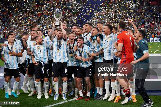 Lionel Messi of Argentina lifts the trophy after winning with his team the Finalissima 2022 match between Argentina and Italy at Wembley Stadium on...