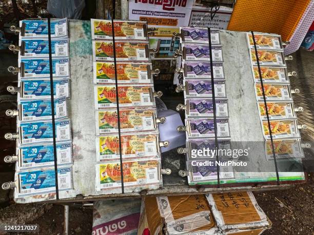 Lottery tickets displayed at a shop along the roadside in Thiruvananthapuram , Kerala, India, on May 12, 2022.