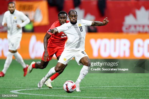 Richie Laryea of Canada, Vurnon Anita of Curacao during the International Friendly match between Canada v Curacao at the BC Place Stadium on June 9,...