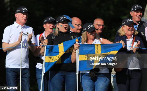 Fans of Peter Hansen of Sweden reacts at the 18th green as he finishes his round during Day Two of the Volvo Car Scandinavian Mixed Hosted by Henrik...