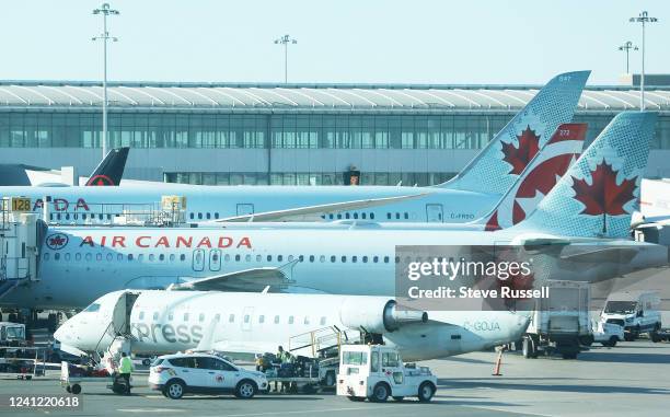 Air Canada airplanes on the Terminal three tarmac at Pearson International Airport that services Toronto in Mississauga. June 10, 2022.