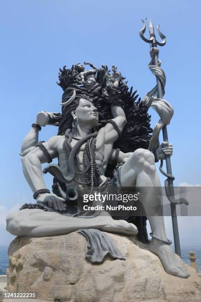 Ft-tall statue of Lord Shiva at the Aazhimala Shiva Temple in Vizhinjam, Thiruvananthapuram , Kerala, India on May 26, 2022. The statue of Lord Shiva...