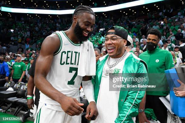 Jaylen Brown of the Boston Celtics talks with rapper, Nelly after Game Three of the 2022 NBA Finals on June 8, 2022 at the TD Garden in Boston,...