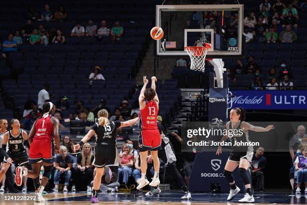 Rui Machida of the Washington Mystics shoots the ball during the game against the Minnesota Lynx on June 10, 2022 at Target Center in Minneapolis,...